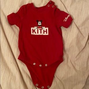 KITH baby onesie
